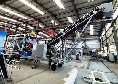 Mobile concrete batching plant with a fully integrated mixing system